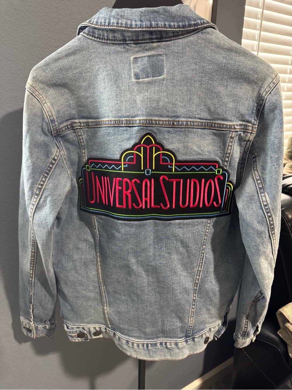 Universal Studios Neon Logo Light Wash Denim Jean Jacket